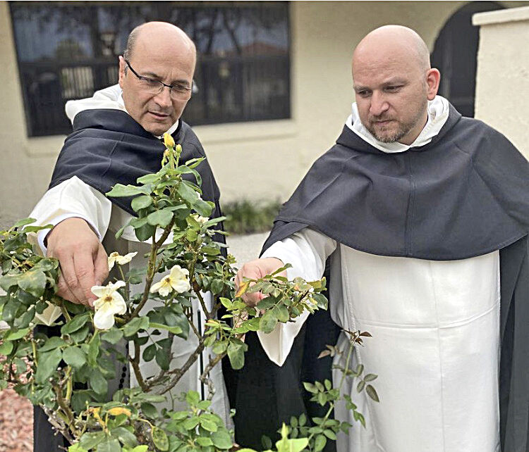 St. Ann pastor and former Dominican, Father Alfonso Cely (left) and Dominican Father Duberney Rodas Grajales celebrate the 800th anniversary of St. Dominic's death.